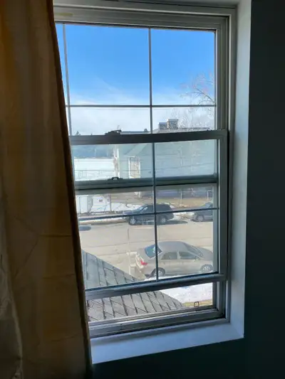 Very small studio room in the top of the old building with no elevator , near Center Street 16 Ave N...