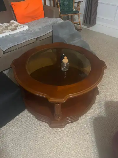 Round coffee table,file cabinet wooden, beautiful piece , heavy 72” tall Desk for office ask cuz we...