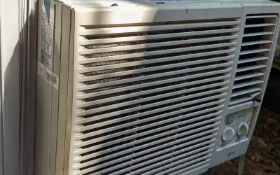 Window air conditioner. 9 amps. 18.5" Width x 14" Height x 20.5" Depth Cord comes out of lower right...