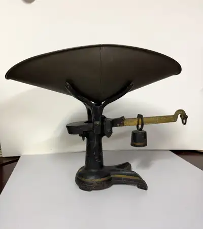 Mercantile counter scale with tray and weights. Cast iron with original gold coloured trim. In very...