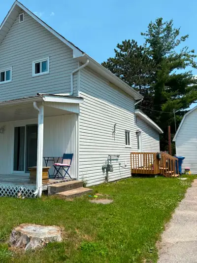 This unit has a large living room, kitchen and dining area. Big Backyard and a garage for storage. U...