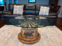 Glass carousel coffee table