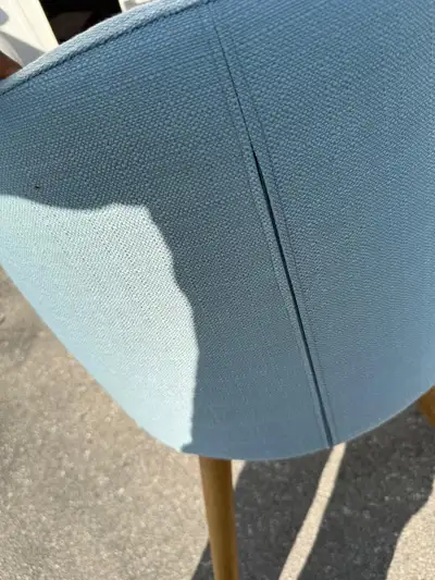 I have 2 of them for $120 Refresh your dining space with this stylish, used light blue fabric dining...