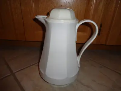 Thermos Brand Coffee Carafe with lid, 10 inches tall, lid screws on and off, white, $15.00, cash onl...