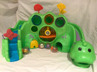 Fisher Price Drop & Roar Dinosaur with original 4 Roll-a-Rounds
