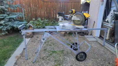 Dewalt 12 inch dual compound mitre saw with Ridgid stand. Asking $425. Call or text 780.781.six282 C...