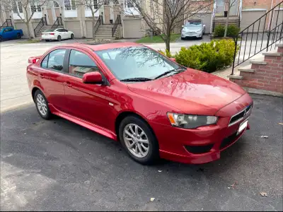 Selling my 2011 Mitsubishi Lancer SE 2.0L FWD (4-door) with only 79,823 km — very low for the year!...