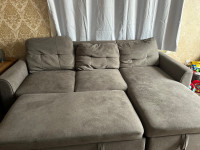 Sectional couch with storage compartment 
