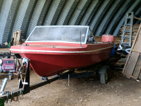 14 ft runabout with evinrude Starlite 4 and trailer
