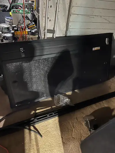 6.5’ hard tonneau cover with everything needed to install made by extang came off of a GMC double ca...