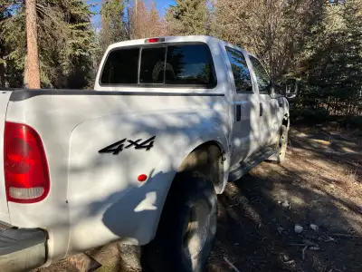 7.31 Cummins Turbo Diesel 4x4 crew cab. Original owner and comes with manual. Bought new for $51,500...
