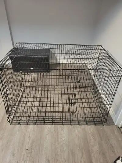Extra large dog crate. Good condition. With the bottom pan.