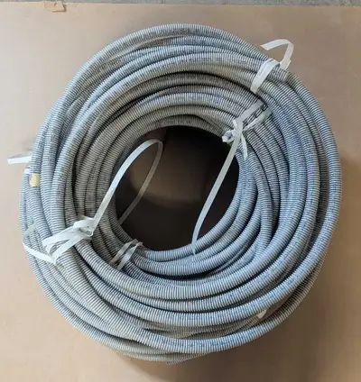 Grey, 1/2" inch, electrical, non-metallic tubing (ENT), Roughlt 100'+ available. It's flexible corru...