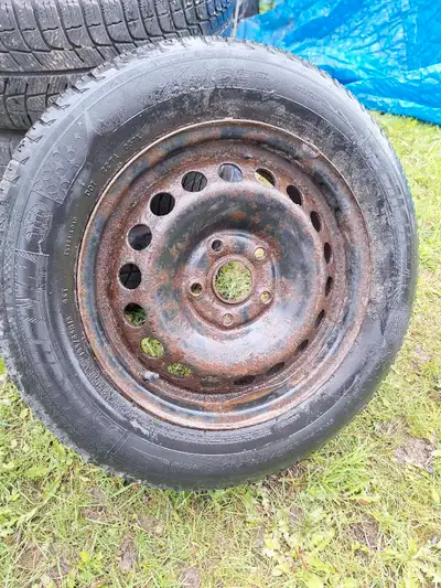 For sale is a set of four winter tires, size 195/65R15, mounted on rims, perfect for providing excel...