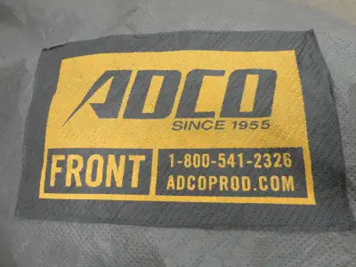 ADCO 5th Wheel Trailer Cover, fits 31 feet 1 inch to 34 feet, part no. 34855, cover was torn and has...
