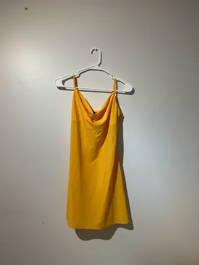 small, bright yellow/orange Forever 21 cowl neck dress Pick up in amherstview or $5 delivery to west...