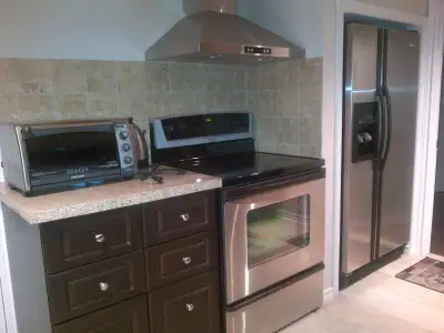PLEASE CONTACT (647)802-6457 - 2 bedroom plus 1.5 washroom basement apartment for rent with kitchen,...