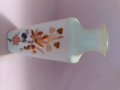 A nice, vintage hand painted Zsolnay Hungary bud vase, with 24k carrot gold decoration on all 4 side...