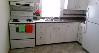 One bedroom apartment available now on ground floor in quiet building, Heat, water, one parking spot...