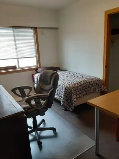 Rental for quiet single person, longer term. Clean single private bedroom on main floor of attractiv...