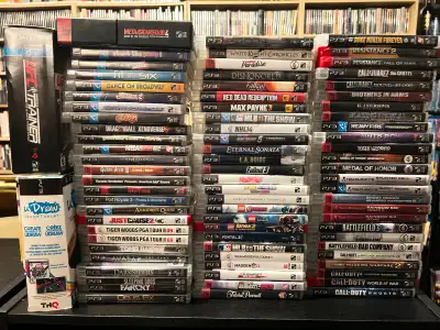 80 Games for PS3, including Metal Gear Solid 4: Limited Edition - uDraw comes with game, box, and ga...