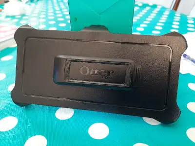 Otterbox cellphone belt holster; fits a Galaxy S21 in a case.