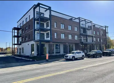 Varennes nouveau construction, 31/2-3+ den ou 41/2-4-2 sdb. Inclusion eau chaude, rangement, câble e...