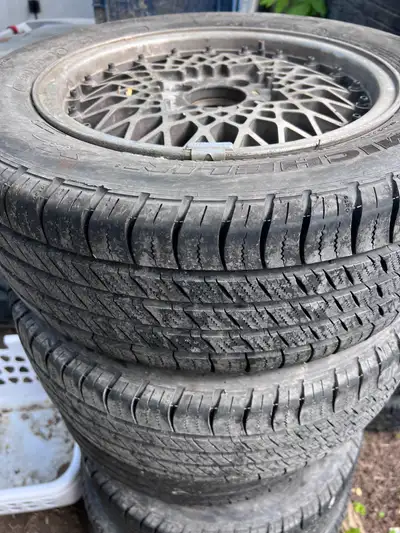 Old school 4x100 rims tires were on a civic size in pics No center caps