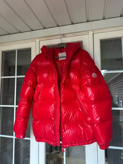 Model: Moncler Ecrin • Color: Glossy red nylon laqué — one of the most recognizable and collectible...