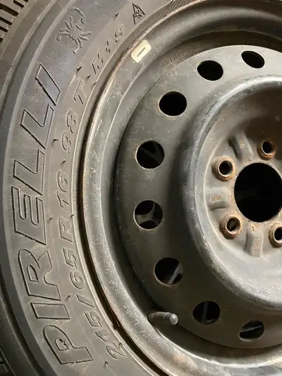 Set of winter tires on rims previously fitted to a Land Rover Freelander. Tires have been in heated...