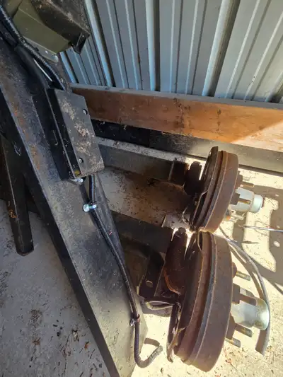 2 available - 7 ton torsion axle, 8 bolt all brand new comes with tires, (ST235/18R16) and some wiri...
