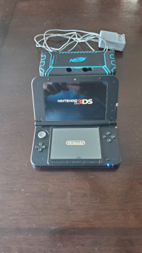 Nintendo 3DS XL System and Game Package.