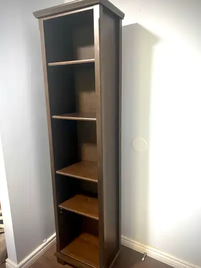 Tall, narrow wooden shelf cabinet type thing. 75” Tall 13” Deep 18” Wide Has 4 moveable shelves. Pic...