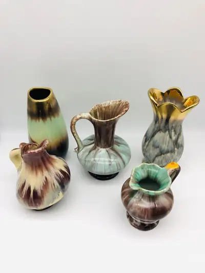 Good condition, set of 5 West German pottery pitchers, vases Between $25 and $40 each or take all 5...