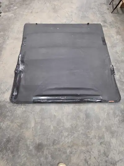 F150 tonneau cover for 2014 f150 with 5.5' foot box Still works but ripped up in a few spots. Bought...