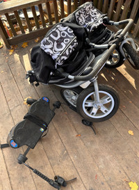 Valco double stroller with a piggy board
