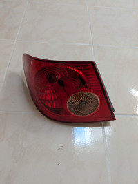 2003-2008 Toyota Corolla Used OEM Tail Light (Outer Left Side)