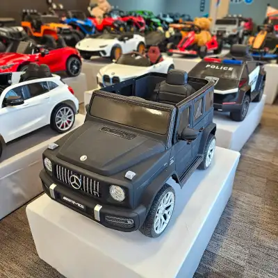 The Mercedes G63 features an eco-leather seat, rubber wheels, remote control for parents, USB and Bl...