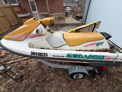 The 1996 Sea-Doo Bombardier GTI is a 10-foot, 2-stroke personal watercraft featuring a 718cc (717) e...