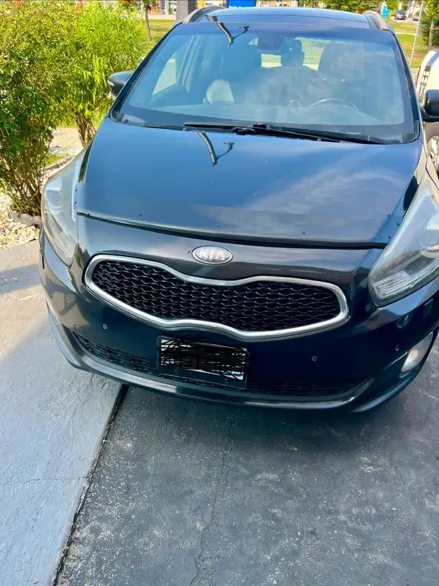 2014 Kia rondo 7 seater running condition