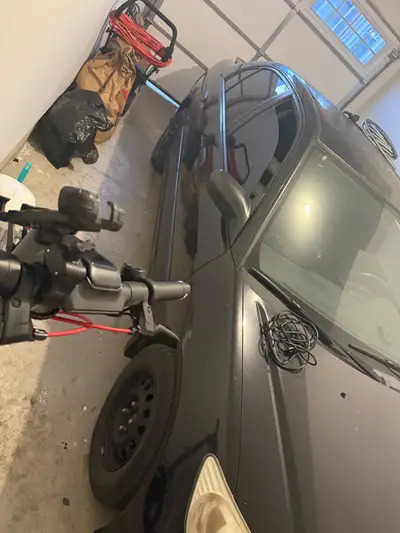 Selling 05 civic runs and drives good sitting on 3 good winter tires 4th tire has a slow leak , was...