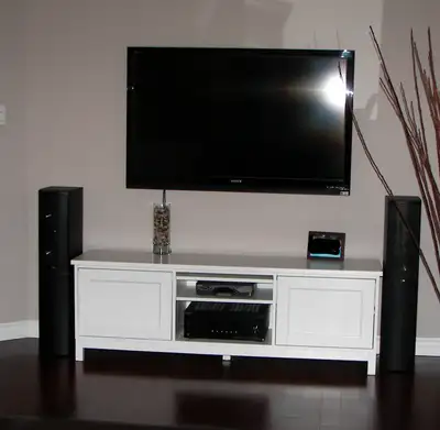 This media unit is solid pine and has been painted with Benjamin Moore Advance Paint in Oxford White...