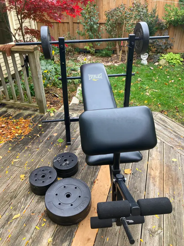 Everlast Bench Press, Bar Bell and 120lb weights.