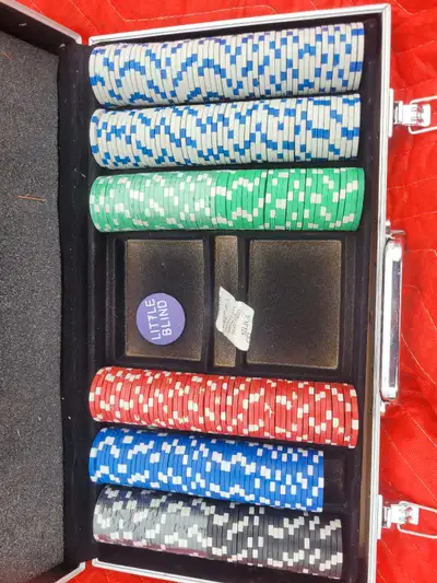 This used poker chip set comes in an aluminum case and includes a variety of multi-coloured chips. T...