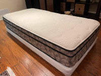 Long single pillow top mattress and box spring