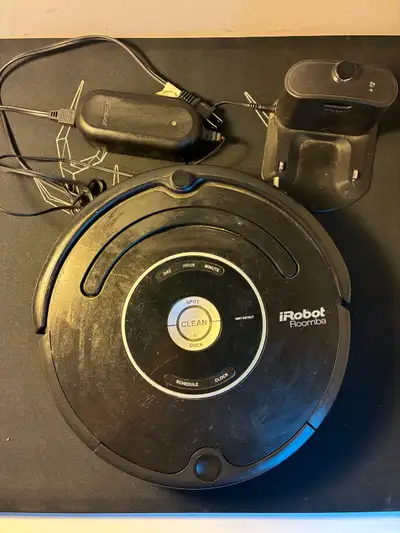Keep your floors clean with this pre-owned iRobot Roomba, featuring Dirt Detect technology and an in...