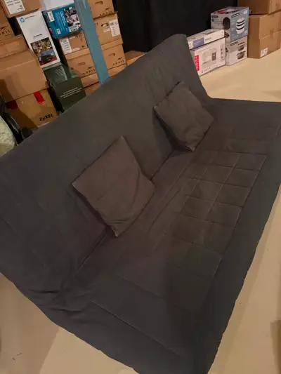 Sofa bed IKEA with foam mattress and two decorative pillows, light use.