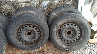 Tread is half worn. All rims/tires hold air. Nexen winter tires. Lug nuts spacing is 5 x 130. Locate...