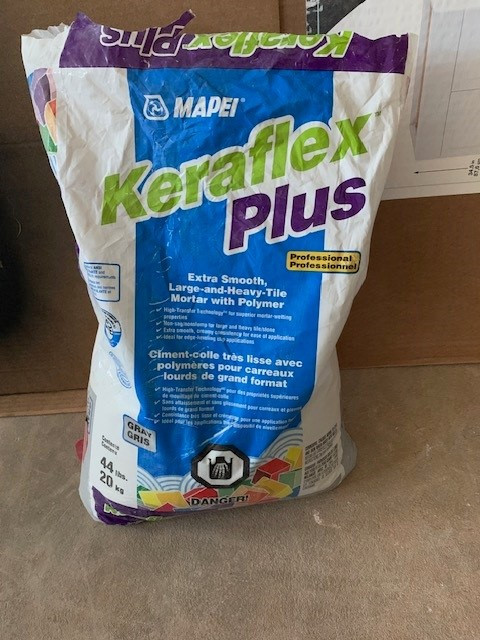 1/2 BAG OF MORTAR FOR LARGE TILES in Floors & Walls in Charlottetown