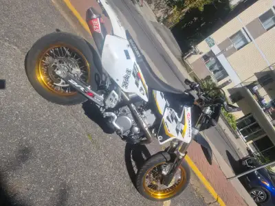 Black white and gold 2015 DR-Z 400 Supermoto. Upgraded with Yoshimura full exhaust kit, 3x3 airbox m...